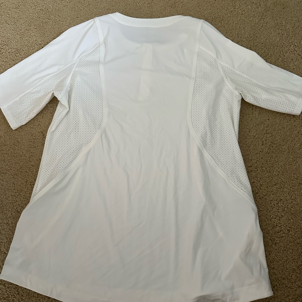 Athleta white half zip, short sleeve, wicking top with mesh inserts. - Picture 2 of 3